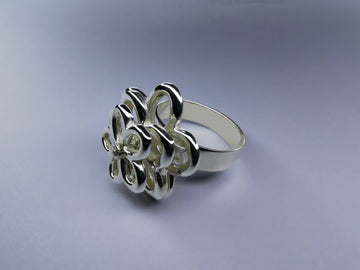 Anillo Flor de Viento Giratoria Plata .925