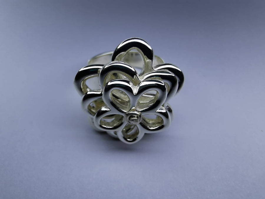 Anillo Flor de Viento Giratoria Plata .925